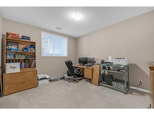 91 Evercreek Bluffs Place Sw, Calgary, AB - Indoor Photo Showing Office