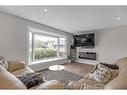 15 Deermont Place Se, Calgary, AB  - Indoor Photo Showing Living Room With Fireplace 