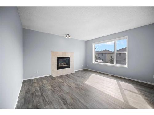 244 Citadel Way Nw, Calgary, AB - Indoor Photo Showing Living Room With Fireplace