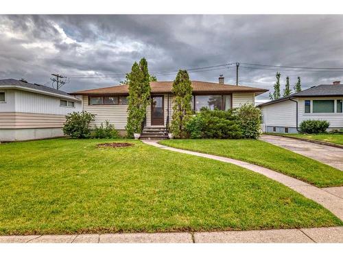 3 Maple Place Sw, Calgary, AB - Outdoor With Facade