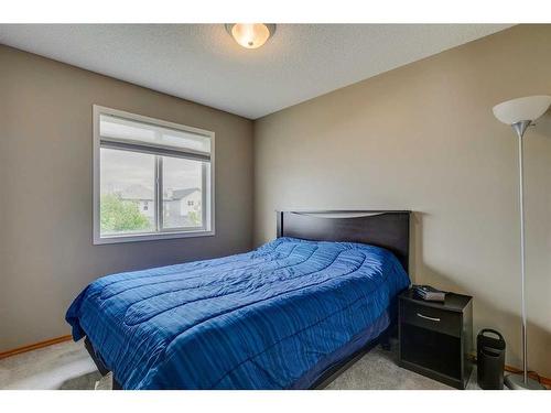 81 Bridlewood Manor Sw, Calgary, AB - Indoor Photo Showing Bedroom