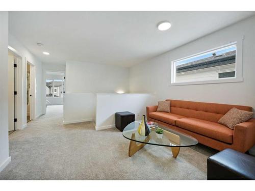 171 Creekstone Way Sw, Calgary, AB - Indoor Photo Showing Living Room