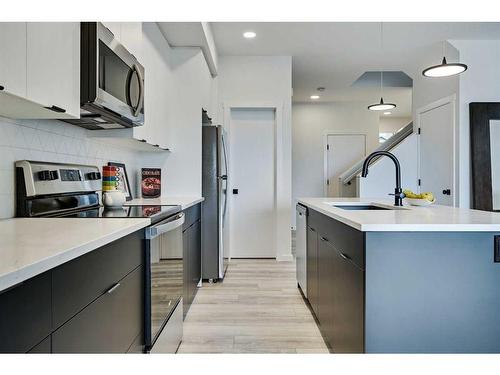 171 Creekstone Way Sw, Calgary, AB - Indoor Photo Showing Kitchen With Stainless Steel Kitchen With Upgraded Kitchen