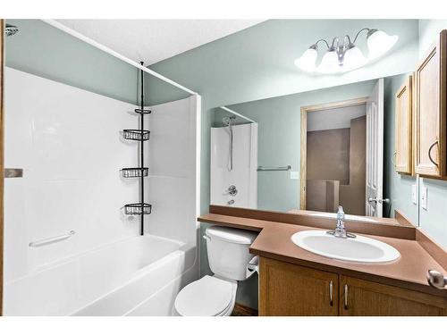 8 Everridge Road Sw, Calgary, AB - Indoor Photo Showing Bathroom