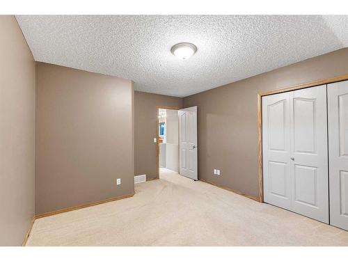 8 Everridge Road Sw, Calgary, AB - Indoor Photo Showing Other Room