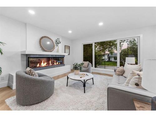 10404 Maplemont Road Se, Calgary, AB - Indoor Photo Showing Living Room With Fireplace