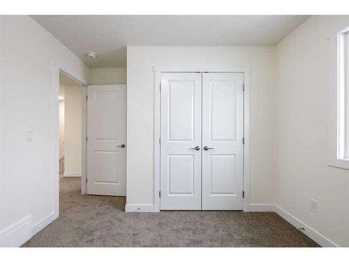 376 Heartland Way, Cochrane, AB - Indoor Photo Showing Other Room