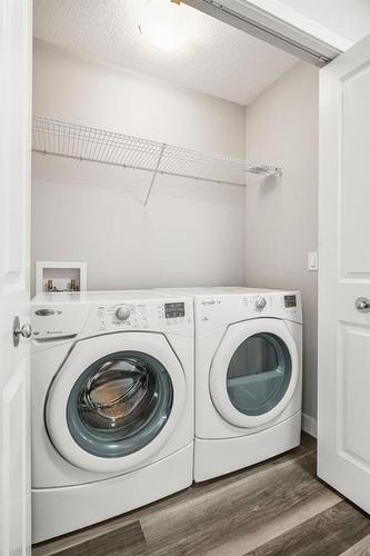 117 Evansridge Park Nw, Calgary, AB - Indoor Photo Showing Laundry Room