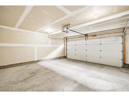 117 Evansridge Park Nw, Calgary, AB - Indoor Photo Showing Garage