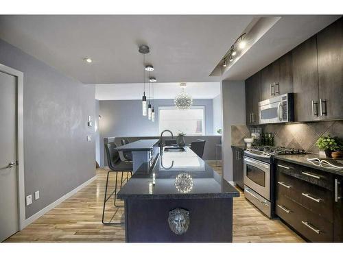 203-180 9 Street Ne, Calgary, AB - Indoor Photo Showing Kitchen With Upgraded Kitchen