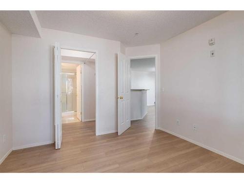 115-3000 Somervale Court Sw, Calgary, AB - Indoor Photo Showing Other Room