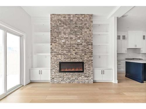 1410 43 Street Sw, Calgary, AB - Indoor Photo Showing Living Room With Fireplace