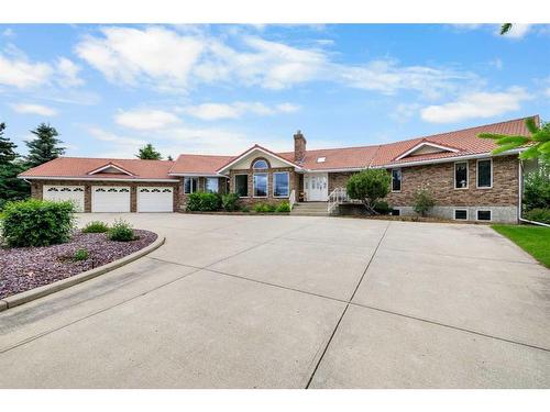 54 Hamilton Drive, Rural Rocky View County, AB - Outdoor With Facade