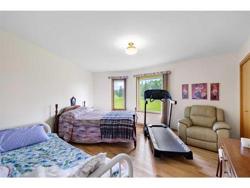 54 Hamilton Drive, Rural Rocky View County, AB - Indoor Photo Showing Bedroom