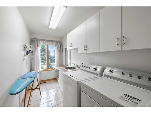 54 Hamilton Drive, Rural Rocky View County, AB - Indoor Photo Showing Laundry Room