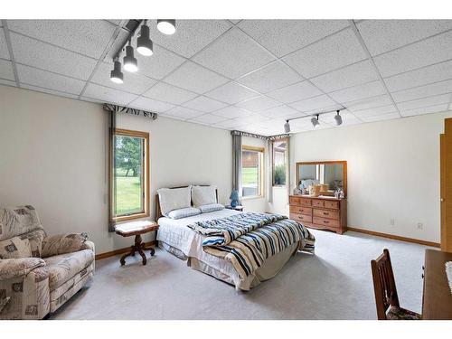 54 Hamilton Drive, Rural Rocky View County, AB - Indoor Photo Showing Bedroom