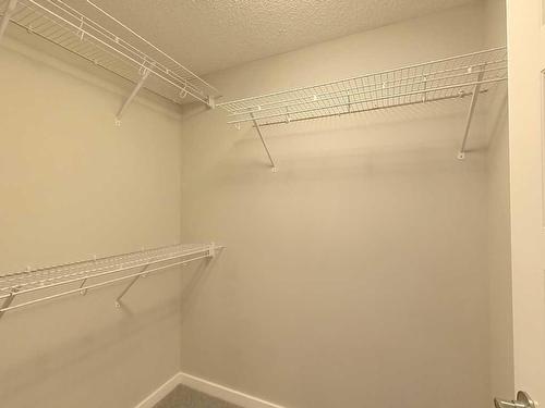 402 Cranford Mews Se, Calgary, AB - Indoor With Storage