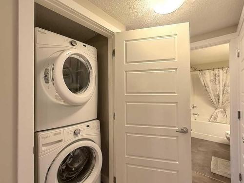 402 Cranford Mews Se, Calgary, AB - Indoor Photo Showing Laundry Room