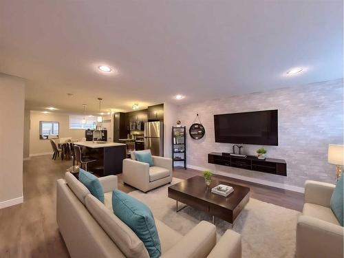 402 Cranford Mews Se, Calgary, AB - Indoor Photo Showing Living Room