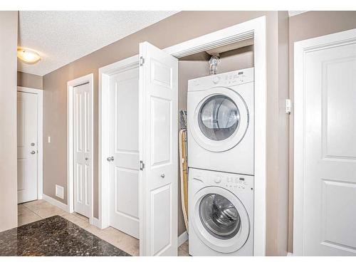 2111-1317 27 Street Se, Calgary, AB - Indoor Photo Showing Laundry Room