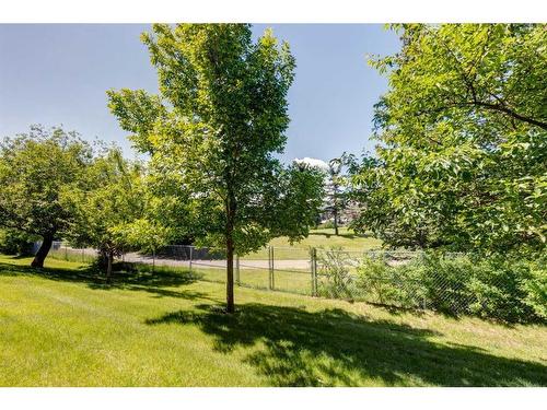 21 Country Hills Gardens Nw, Calgary, AB - Outdoor With Deck Patio Veranda With Exterior