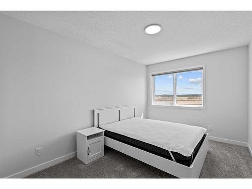 268 Seton Villas Se, Calgary, AB - Indoor Photo Showing Bedroom