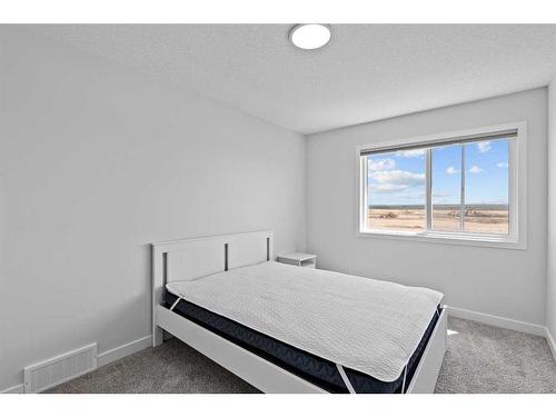 268 Seton Villas Se, Calgary, AB - Indoor Photo Showing Bedroom