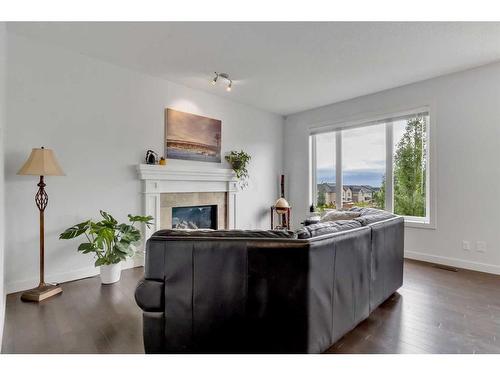 34 Sage Berry Way Nw, Calgary, AB - Indoor Photo Showing Other Room With Fireplace