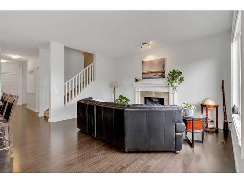 34 Sage Berry Way Nw, Calgary, AB - Indoor With Fireplace