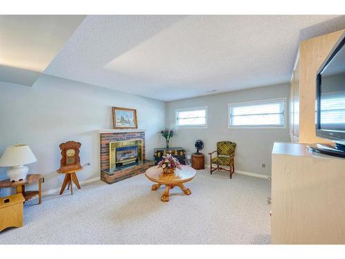 6711 Silverview Drive Nw, Calgary, AB - Indoor With Fireplace