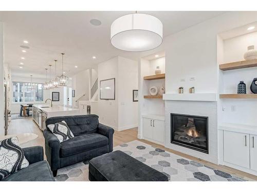 2010 41 Avenue Sw, Calgary, AB - Indoor Photo Showing Living Room With Fireplace