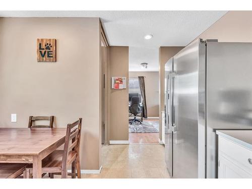 908 Olympia Crescent Se, Calgary, AB - Indoor Photo Showing Dining Room