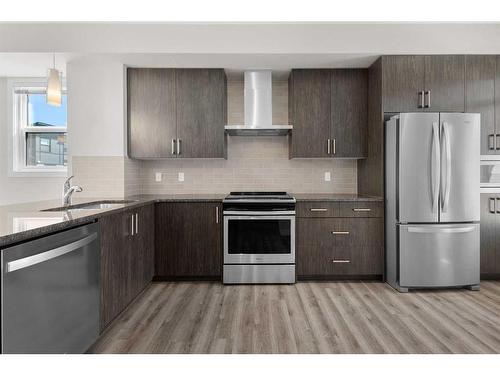 38-138 Seton Passage Se, Calgary, AB - Indoor Photo Showing Kitchen With Upgraded Kitchen