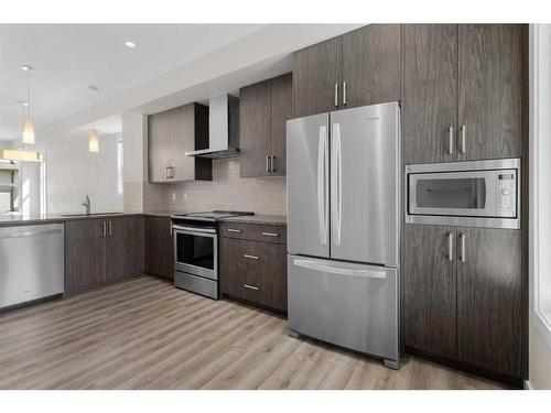 38-138 Seton Passage Se, Calgary, AB - Indoor Photo Showing Kitchen With Upgraded Kitchen