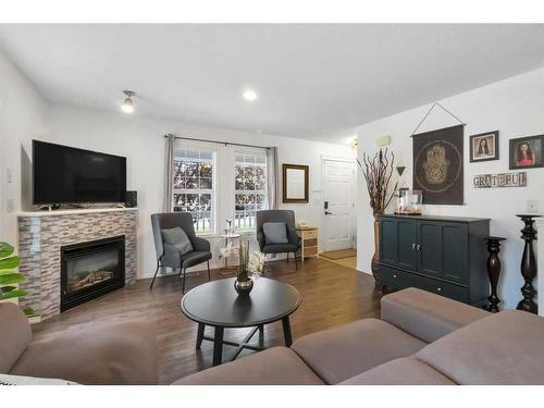 70 Country Village Gate Ne, Calgary, AB - Indoor Photo Showing Living Room With Fireplace