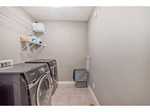 48 Panton Way Nw, Calgary, AB - Indoor Photo Showing Laundry Room