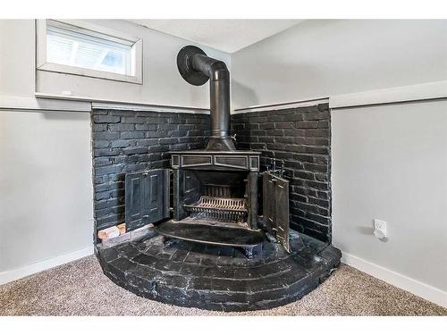 955 Midridge Drive Sw, Calgary, AB - Indoor With Fireplace