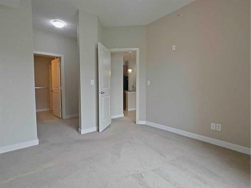 403-156 Country Village Circle Ne, Calgary, AB - Indoor With Storage