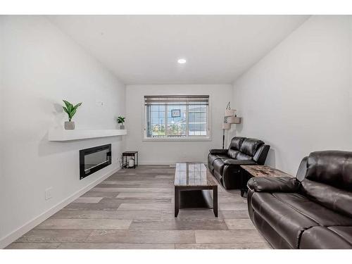 37 Legacy Glen Point Se, Calgary, AB - Indoor Photo Showing Living Room With Fireplace