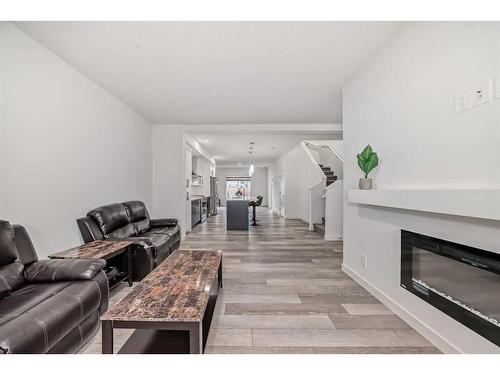 37 Legacy Glen Point Se, Calgary, AB - Indoor Photo Showing Living Room With Fireplace