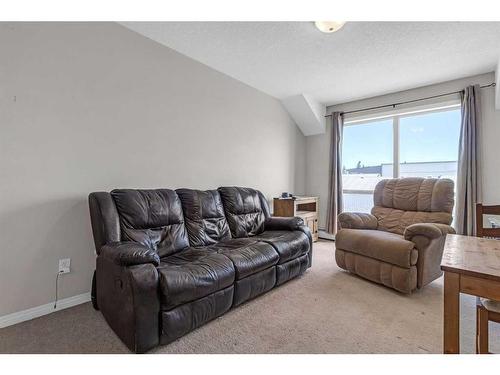 207-1010 Railway Street, Crossfield, AB - Indoor Photo Showing Living Room