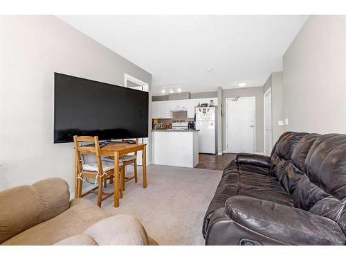 207-1010 Railway Street, Crossfield, AB - Indoor Photo Showing Living Room