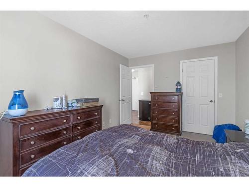 207-1010 Railway Street, Crossfield, AB - Indoor Photo Showing Bedroom