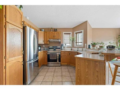 25 Harvest Oak Drive Ne, Calgary, AB - Indoor Photo Showing Kitchen With Stainless Steel Kitchen With Double Sink
