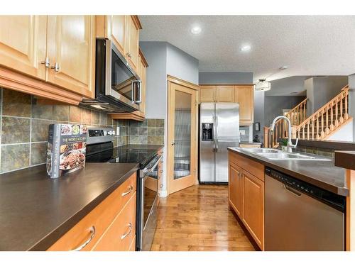 753 Auburn Bay Boulevard Se, Calgary, AB - Indoor Photo Showing Kitchen With Stainless Steel Kitchen With Double Sink