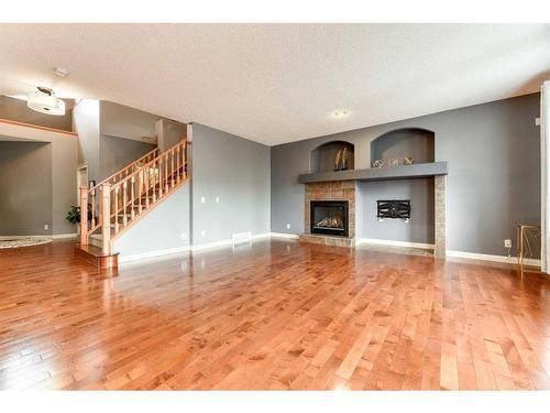 753 Auburn Bay Boulevard Se, Calgary, AB - Indoor Photo Showing Living Room With Fireplace