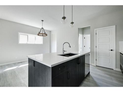 3242 Chinook Winds Drive Sw, Airdrie, AB - Indoor Photo Showing Kitchen With Double Sink