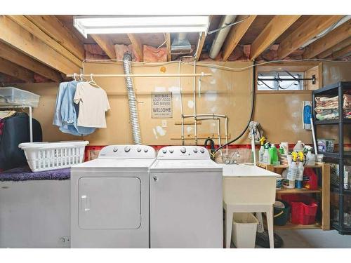 71 Cedargrove Place Sw, Calgary, AB - Indoor Photo Showing Laundry Room