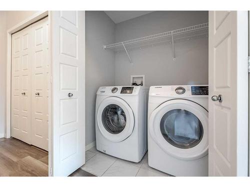 302-300 Harvest Hills Place Ne, Calgary, AB - Indoor Photo Showing Laundry Room