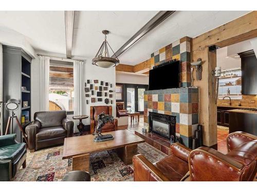 3219 Elbow Drive Sw, Calgary, AB - Indoor Photo Showing Living Room With Fireplace